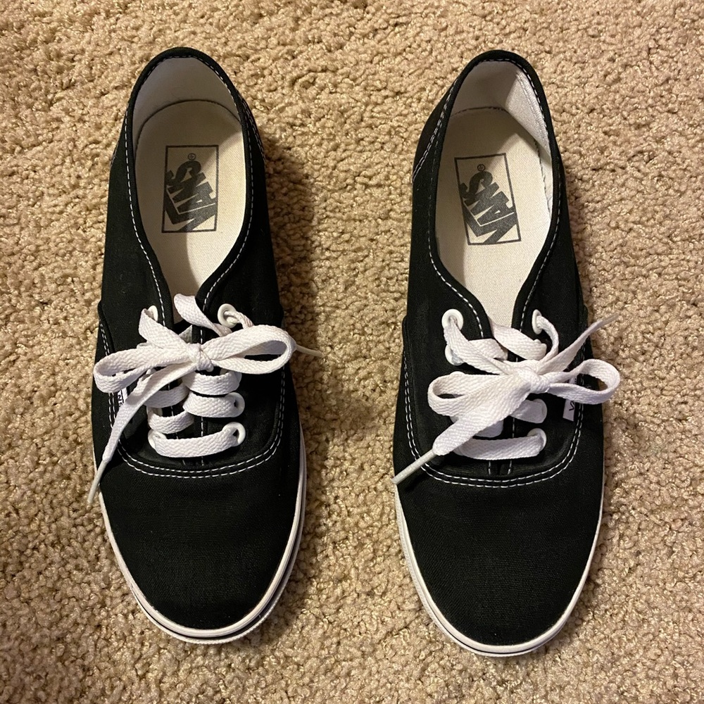 Black Vans lace up sneakers